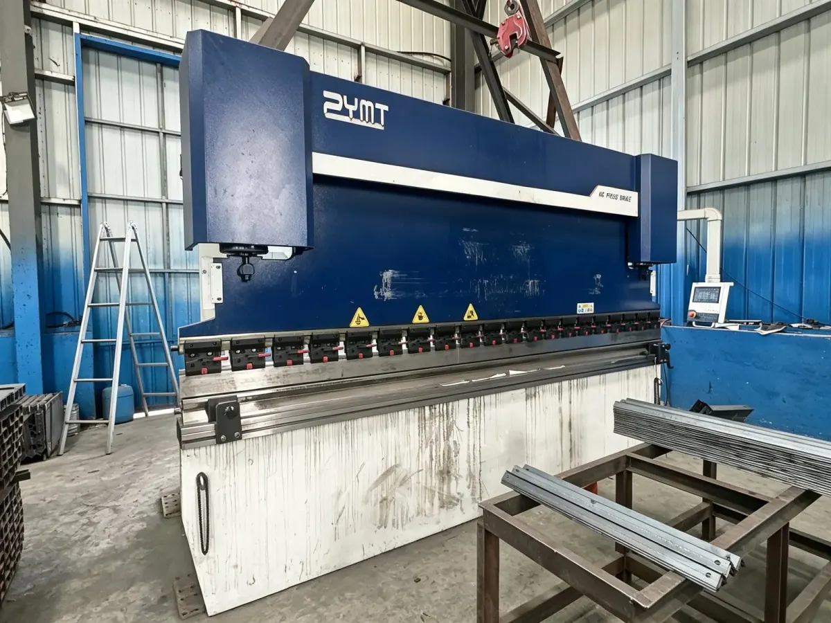 CNC press brake forming formwork panels in the workshop