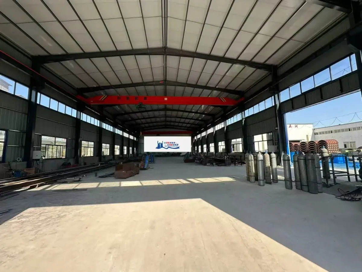 Workshop interior with overhead crane and custom mould assemblies